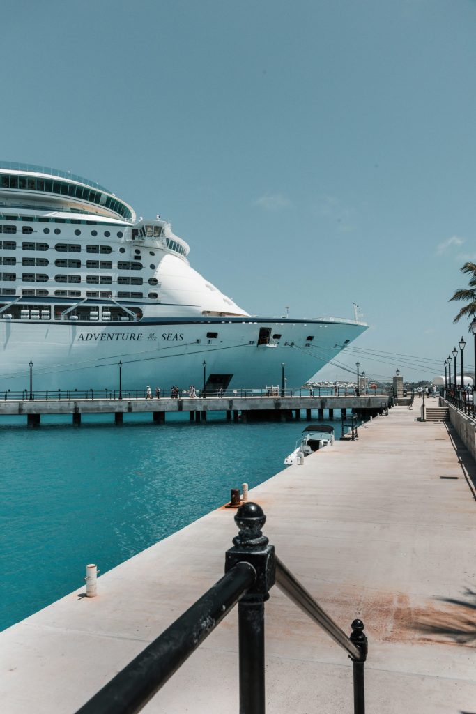 white cruise ship on dock during daytime
